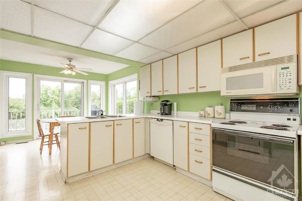 kitchen upgrade before photo Ottawa rental maintenance